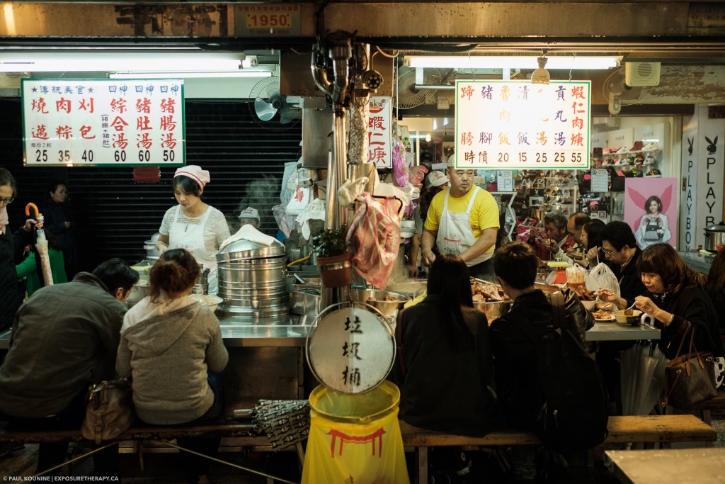 Taipei street food stalls with green tint white balance.