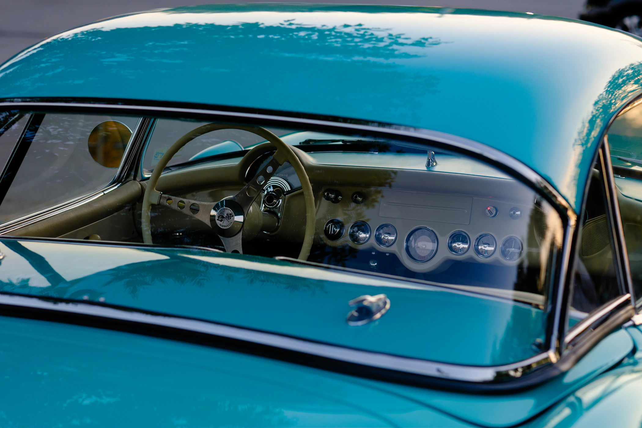Classic Chevrolet Corvette during blue hour twilight.